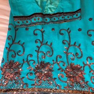 Teal/sea foam georgette copper sequin sari